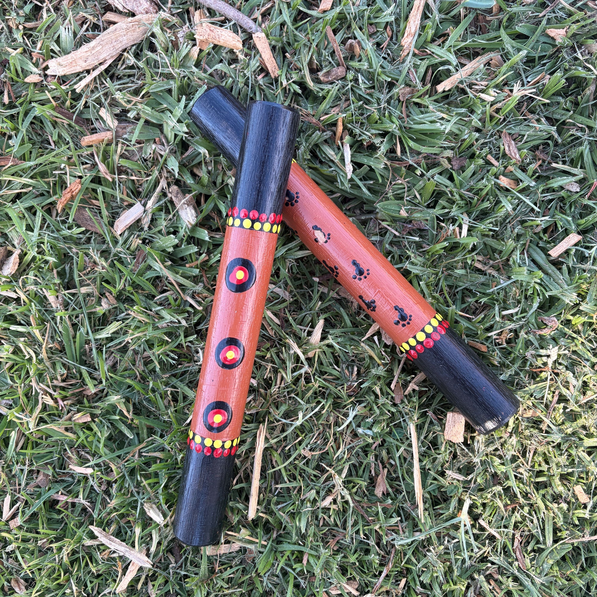 Hand Painted Clap Sticks Brown with Footprints and waterholes